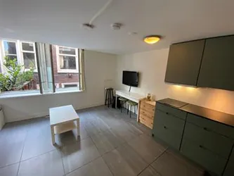 Foto van de Appartement gelegen aan de Nieuwezijds Voorburgwal in Amsterdam