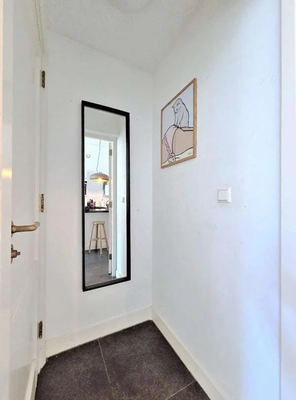 Foto van de Appartement gelegen aan de Oudezijds Voorburgwal in Amsterdam