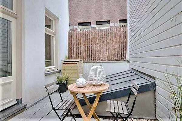 Foto van de Appartement gelegen aan de Oudezijds Voorburgwal in Amsterdam