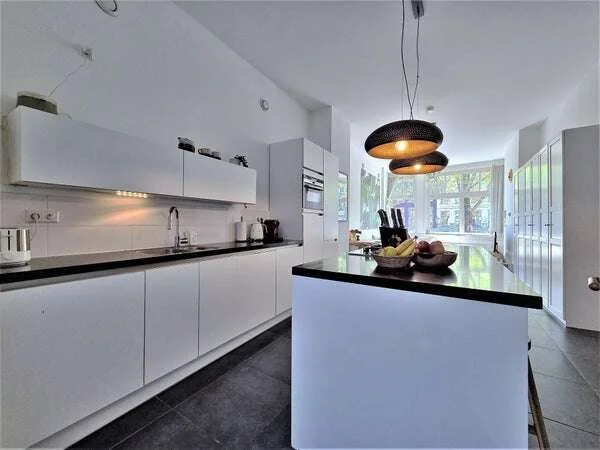 Foto van de Appartement gelegen aan de Oudezijds Voorburgwal in Amsterdam