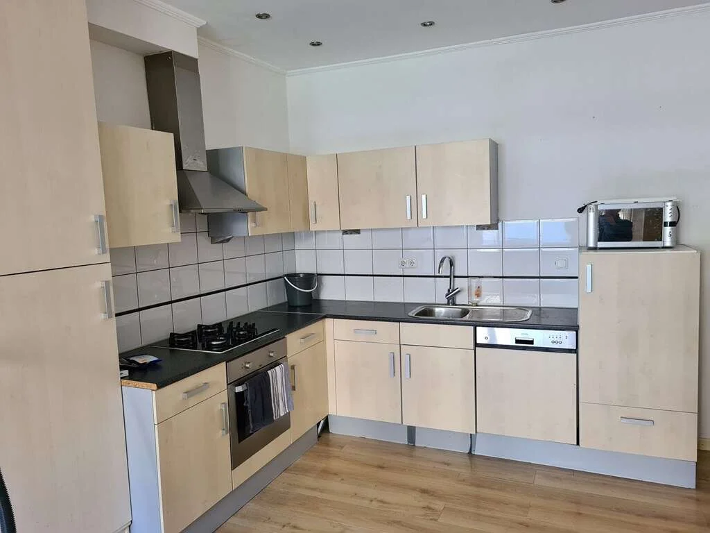 geblurde versie van de foto als achtergrond