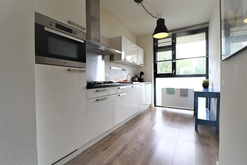 geblurde versie van de foto als achtergrond