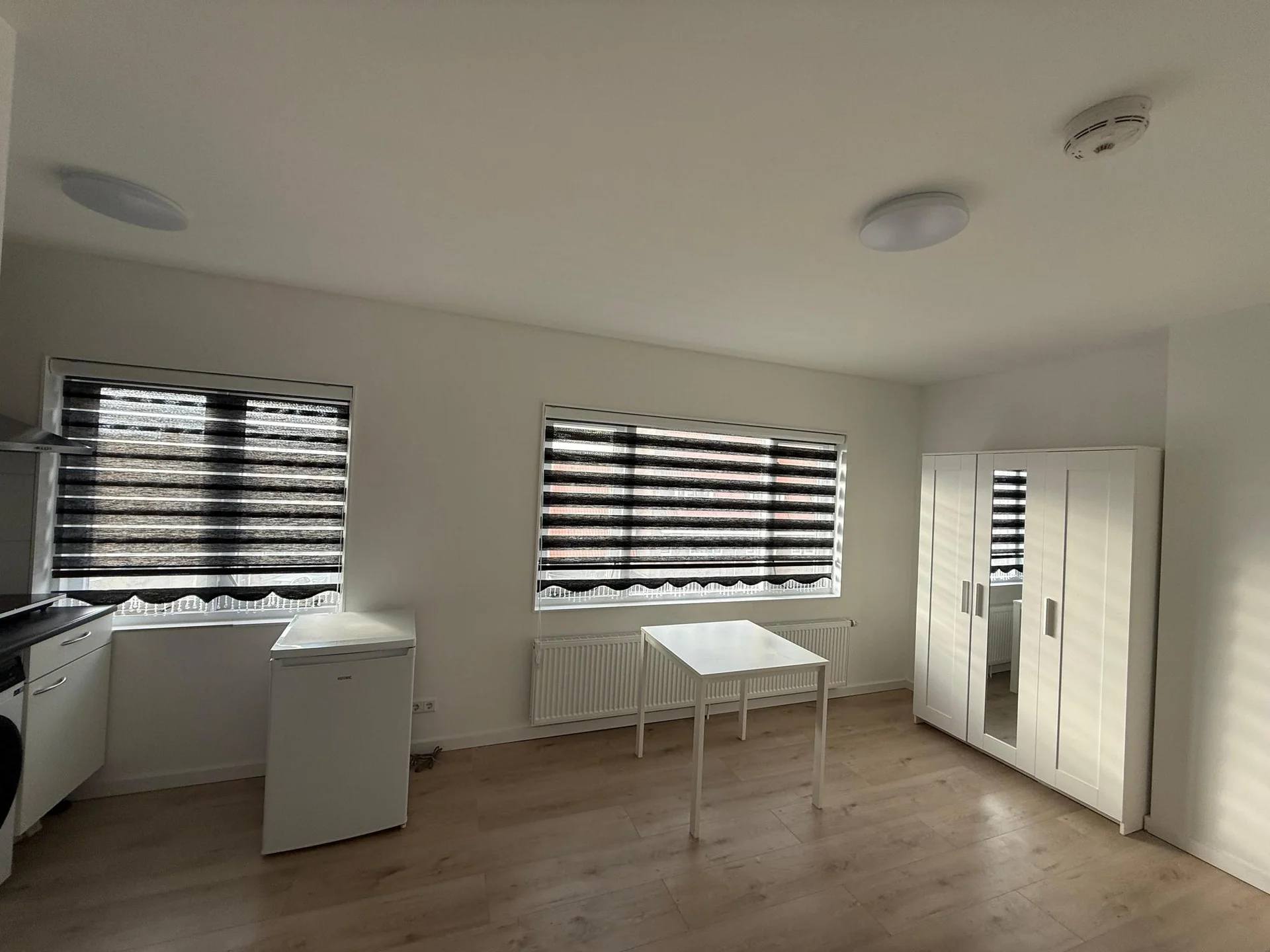 geblurde versie van de foto als achtergrond