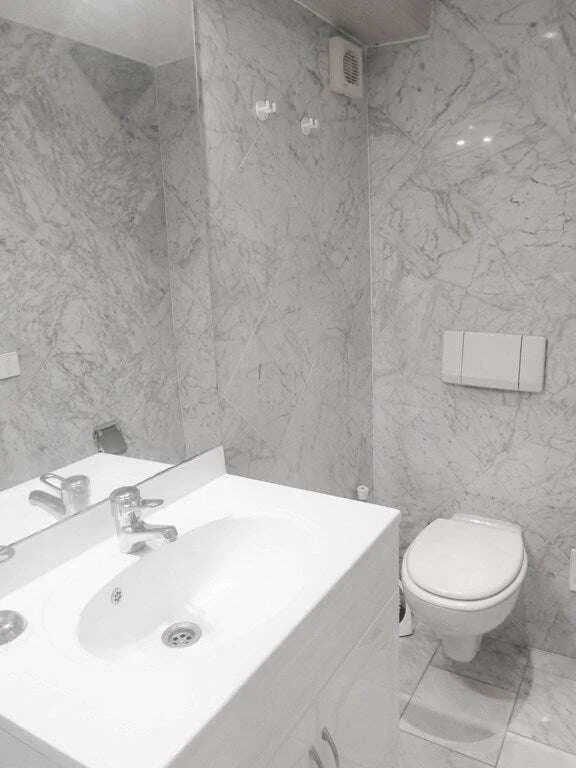 Foto van de Appartement gelegen aan de Oudezijds Voorburgwal in Amsterdam