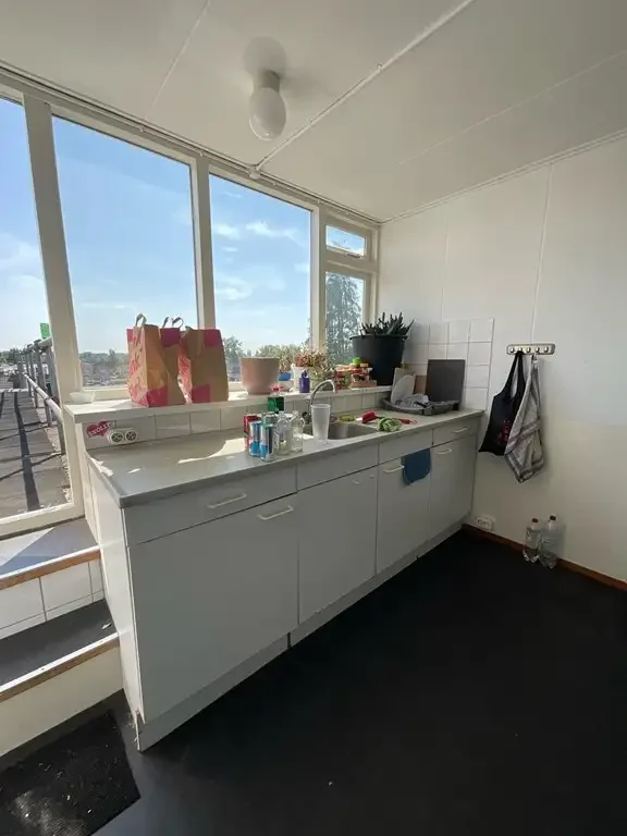 geblurde versie van de foto als achtergrond