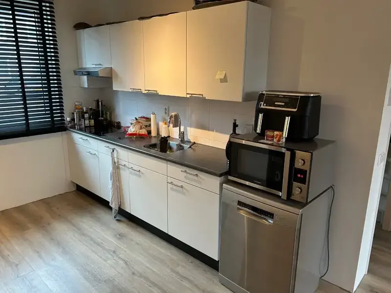 geblurde versie van de foto als achtergrond