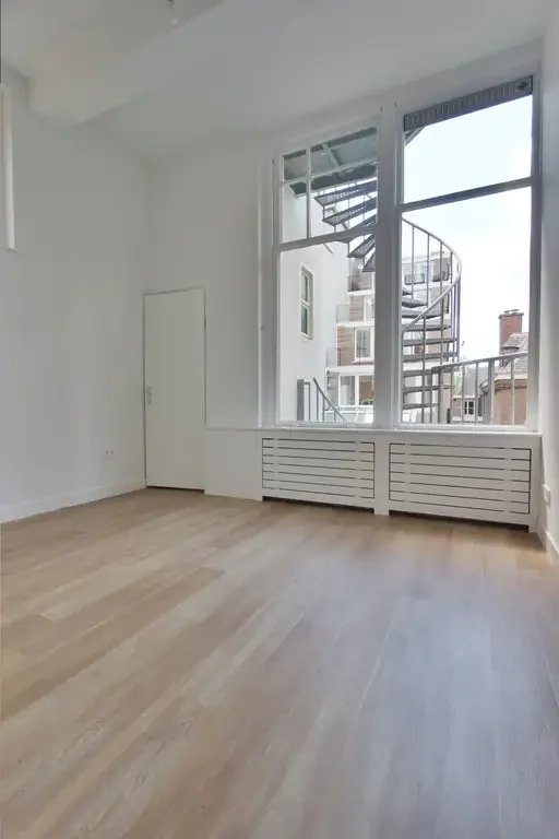 Foto van de Appartement gelegen aan de Nieuwezijds Voorburgwal in Amsterdam