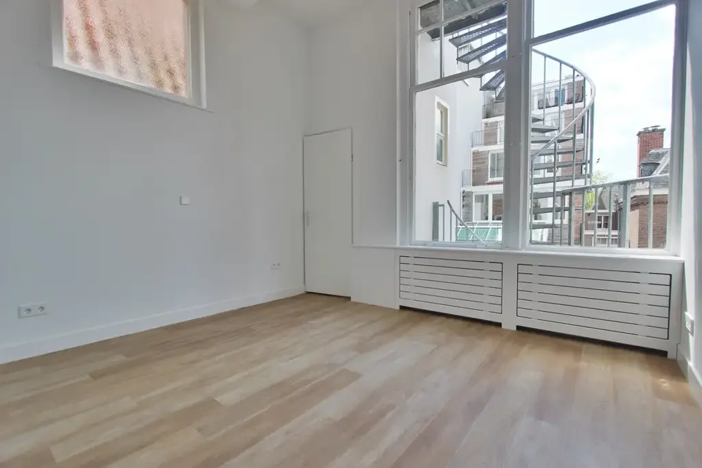 Foto van de Appartement gelegen aan de Nieuwezijds Voorburgwal in Amsterdam