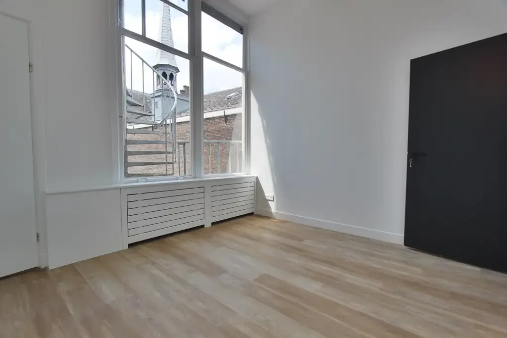 Foto van de Appartement gelegen aan de Nieuwezijds Voorburgwal in Amsterdam