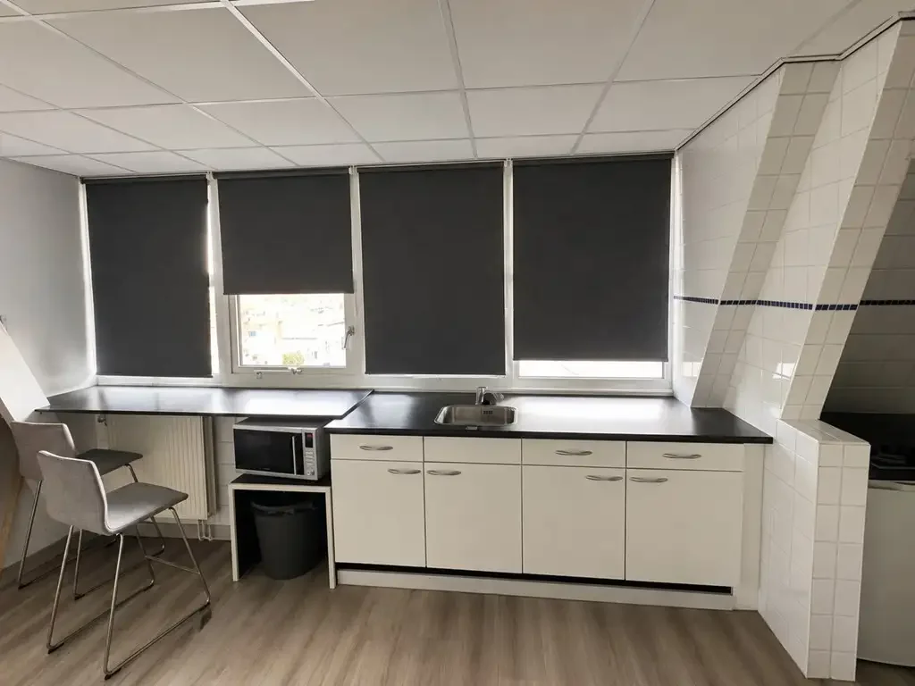 geblurde versie van de foto als achtergrond