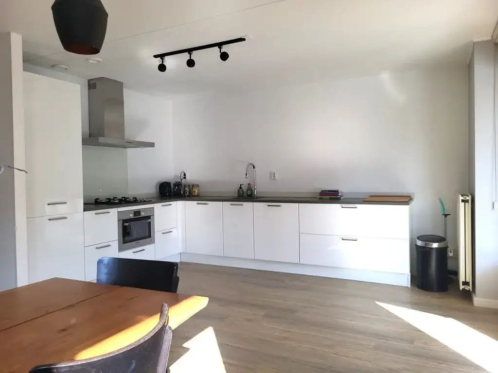 geblurde versie van de foto als achtergrond